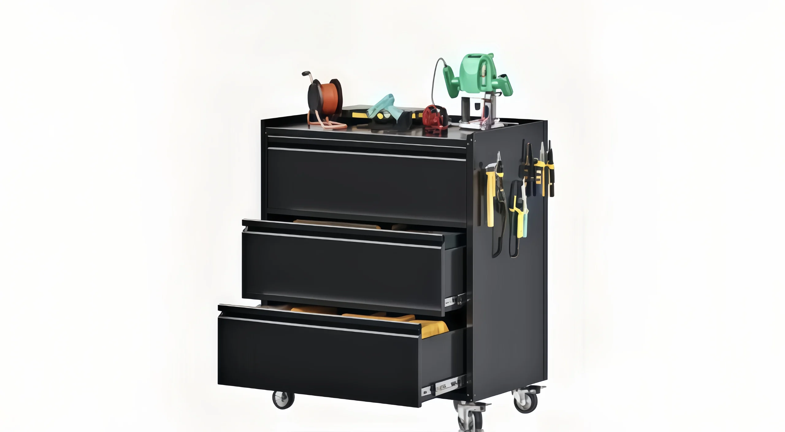 Garage cabinet set with three drawers and various tools on top