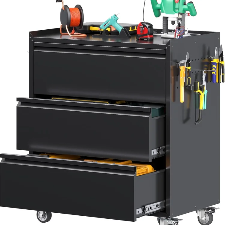 Garage cabinet set with three drawers and various tools on top